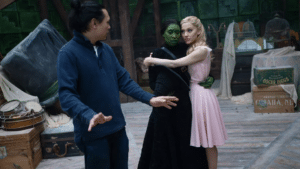 Jon M. Chu, Cynthia Erivo and Ariana Grande on the set of Wicked. Photo: Giles Keyte/Universal Pictures